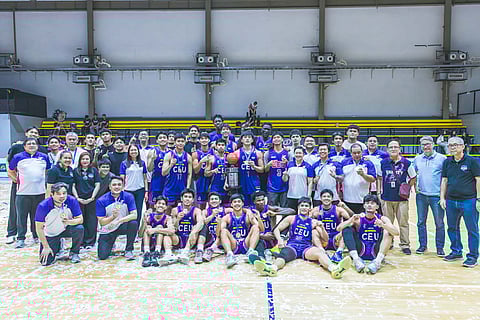 THE CEU Scorpions celebrate with school officials Dr. Carlito B. Olaer, vice president for Student Affairs; Jericho Orlina, assistant vice president for Business Affairs; and UCAL executive director Horacio Lim after beating the Olivarez Sea Lions to secure the Season 8 basketball crown on Thursday.
