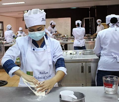 WOMEN train on pastry making at the Anihan Technical School in Calamba City, Laguna.
