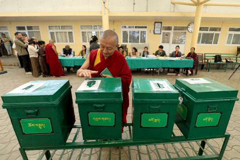 A BUDDHIST monk casts his ballot at a polling station in Dharamsala on 26 April 2026 during the final round of parliamentary elections held for exiled Tibetans. Tibetans outside Chinese control vote for a government-in-exile, an election of heightened significance as they brace for an inevitable, eventual, future without their revered spiritual leader, the Dalai Lama.