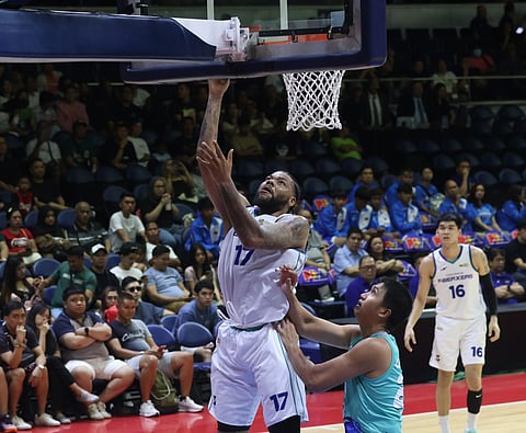 Donovan Smith, now playing for Converge, bangs in 32 points and collars 12 rebounds en route to a 130-103 win over former team Phoenix in the PBA Commissioner’s Cup on Sunday at the Smart Araneta Coliseum.