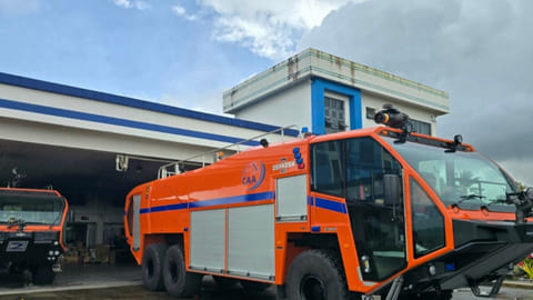OFFICIALS from the Civil Aviation Authority of the Philippines lead the blessing of a new Oshkosh Striker 6x6 Aircraft Rescue and Fire Fighting vehicle, an ambulance and a tractor at Laoag International Airport on Monday.