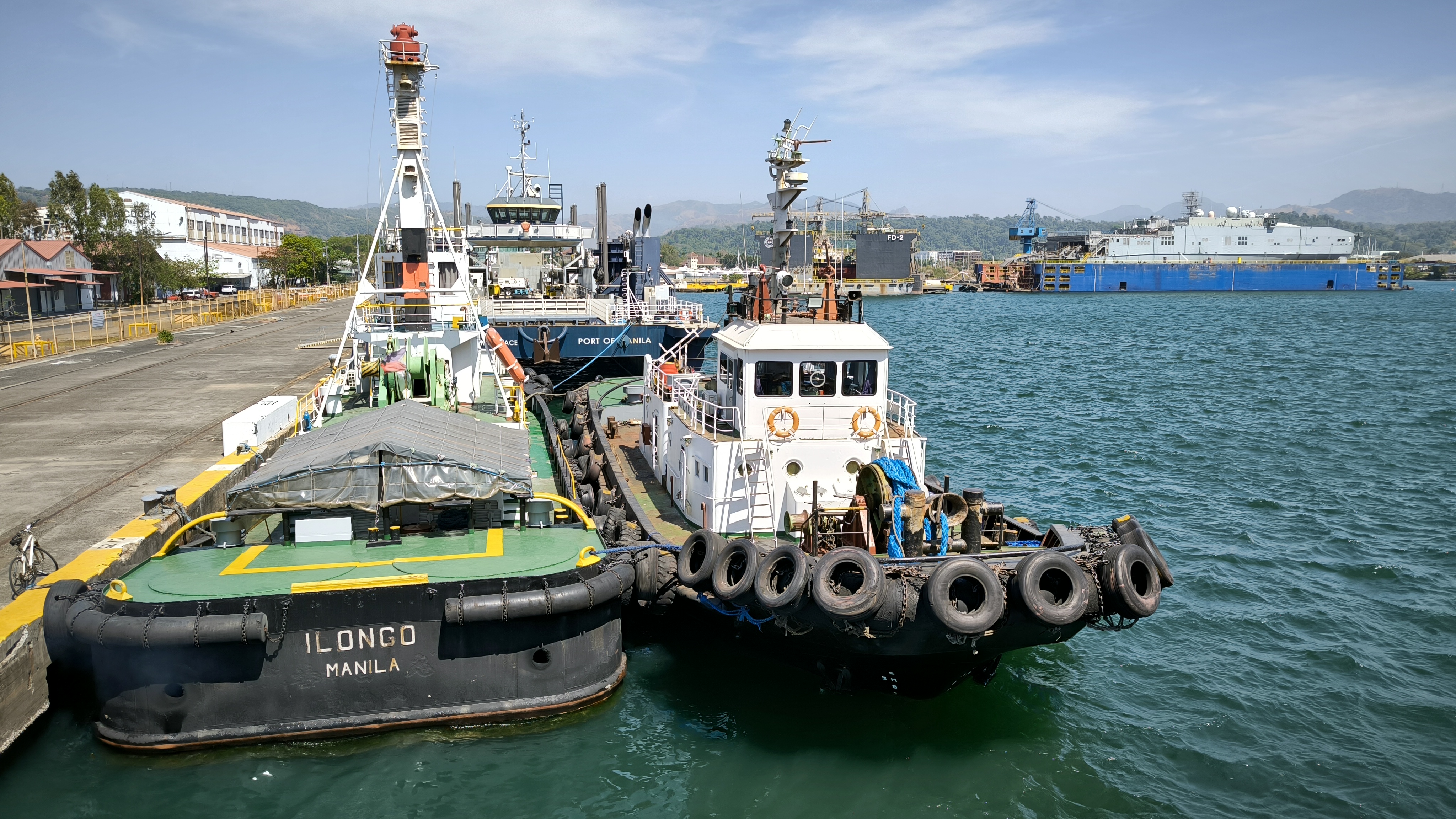 Various kinds of boats are docked at the Port of Subic.