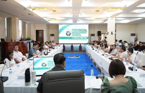 Vice Gov. Dennis “Delta” Pineda (back view, seated on gray chair) leads PDC meeting, 28 April.