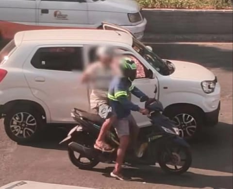 CCTV footage shows the moment gunmen on a motorcycle opened fire on a white SUV at the intersection of EDSA and Timog Avenue in Quezon City. The daylight attack killed a 75-year-old businessman and his driver.