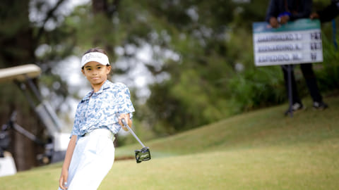 Mavis Espedido celebrates her wire-to-wire win in the girls’ 11-14 division of the ICTSI John Hay Junior PGT Championship on Wednesday.