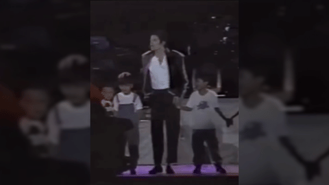 IC Mendoza (kid in white) with Michael Jackson on stage.