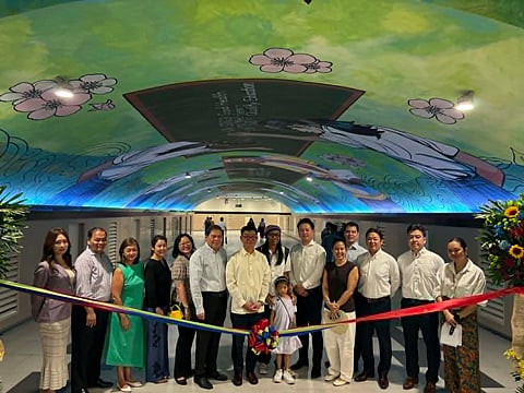 Artist AG Saño, executives from Security Bank and Mitsubishi UFJ Financial Group (MUFG) lead the ribbon cutting ceremony for the 10th anniversary mural launch at the Paseo de Roxas Underpass, Makati City on Thursday, 30 April.