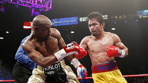 Manny Pacquiao swears his rematch with Floyd Mayweather is still on.