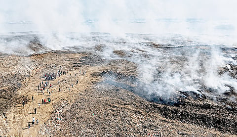 An aerial view of the Navotas Sanitary Landfill on 16 April shows a fire that has been burning for days, affecting nearby communities in Navotas, Malabon and Obando, Bulacan.