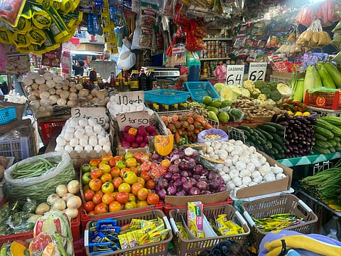 Supermarket vendors at Bustillos spent Labor Day working instead of resting, saying the rising cost of living leaves them no choice but to keep earning, while some workers marked the holiday with modest family gatherings adjusted to higher prices.