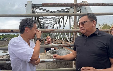 DEPARTMENT of Public Works and Highways Secretary Vince Dizon (left)expresses frustration over the 15-year delay of the Kilicao-Binitayan Bridge in Daraga, Albay, noting the long-overdue project should already be serving local motorists and residents.