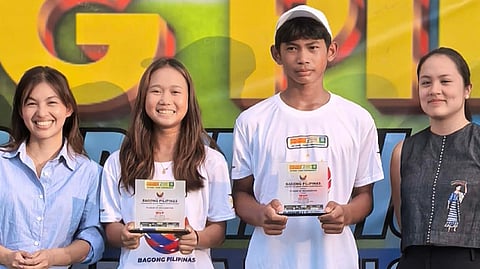 KATHLYN Bugna smiles after completing another three-title romp, including two crowns in singles, in the Bagong Pilipinas age-group tournament. Joining her are (from left) PCO Assistant Secretary Patricia Martin, and co-MVP Miguel Lagac III and Claudia Cojuangco.