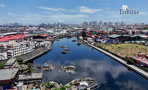 Some families seen living in rafts at the boundary of Caloocan and Navotas City last 6 May.