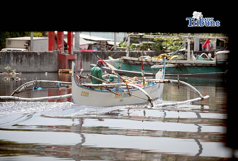 (May 06 2026) Fishers riding a fishing boat passing at the bridge of Pasiwata bridge boundary of Caloocan and Navotas City, on Wednesday May 6 2026, the Department of Agriculture-Bureau of Fisheries and Aquatic Resources (DA-BFAR) has initiated the distribution of P3,000 fuel subsidies to qualified fisherfolk across various regions in the Philippines as of March and April 2026, aimed at cushioning the impact of rising fuel prices. Photo/Analy Labor