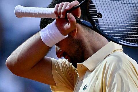 NOVAK Djokovic reacts after bowing to Croatian qualifier Dino Prizmic in the second round of the Italian Open men’s singles event.