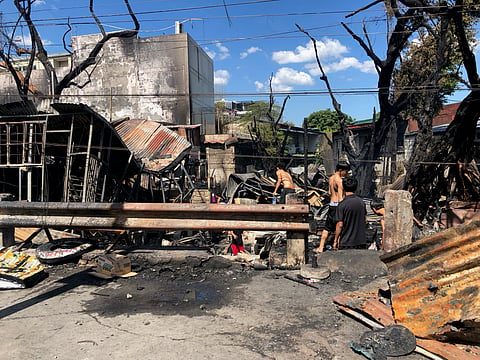 The aftermath of the fire incident happened 9 May in Barangay Bagong Pag-asa, Quezon City. (Photo by Sean Magbanua for the Daily Tribune).