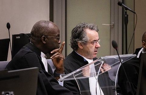 Deputy Prosecutor Mame Mandiaye Niang (left) and Prosecutor and Senior Trial Lawyer Julian Nicholls during the confirmation of charges hearing against ex-president Rodrigo Duterte in February.