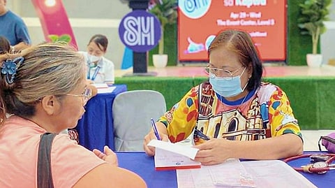 A PATIENT gets free medical consultation at the SM Foundation’s Gamot Para sa Kapwa medical mission in SM City Urdaneta Central.