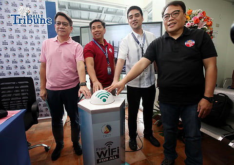 METROPOLITAN Manila Development Authority chairperson Don Artes (right), Department of Information and Communications Technology Secretary Henry Aguda (left) and Pasig Mayor Vico Sotto (second from right) activate free Wi-Fi at the San Joaquin Ferry Station on Thursday.
