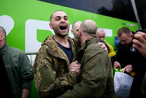 A FORMER Ukrainian prisoner of war reacts following an exchange at an undisclosed location, amid the Russian invasion in Ukraine.