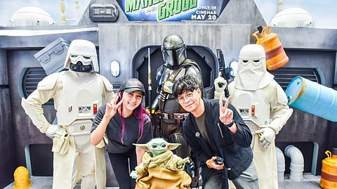 MALLGOERS pose with Star Wars characters and Grogu during the ‘Star Wars Most Wanted’ pop-up event at SM North EDSA ahead of the theatrical release of The Mandalorian and Grogu.