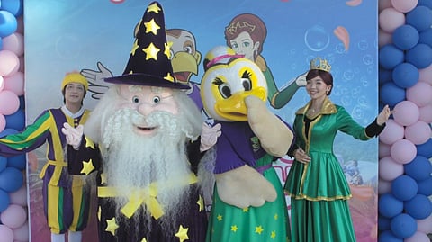 ELDAR the Wizard, Aruga, and Faerie Queen greet guests during Enchanted Kingdom’s month-long Mother’s Day celebration at Eldar’s Theater.