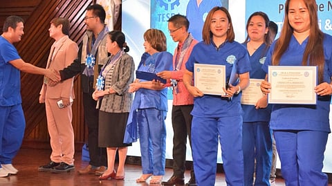 DMW, TESDA graduate OFW Upskilling Program batch