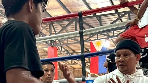 TWO-DIVISION world champion Gerry Peñalosa shares his knowledge with Filipino fighter Kenneth Llover in their Cavite training camp for next month’s big fight in Japan.