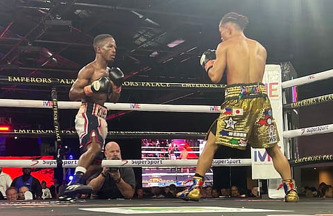 MELVIN Jerusalem (right) hands the WBC strawweight title to Siyakholwa Kuse on a 12-round unanimous decision on Saturday night (early Sunday morning in Manila) in Johannesburg, South Africa.