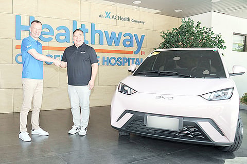 DONATION from BYD Cars Philippines reached Healthway Cancer Care Hospital after sales of the Seashell Pink Seagull supported the Cancer Care Hope Fund. Shown are (from left): Jef Peeters, president and CEO of Healthway Medical Network and Bob Palanca, managing director of BYD Cars Philippines.