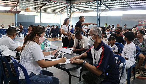 MEDICAL staff treat a patient during a free medical mission in Mariveles, Bataan. AboitizPower, through its private limited partnerships GNPower Mariveles Energy Center and GNPower Dinginin, provided free healthcare services to 109 patients in the province under its Medikalinga Program.