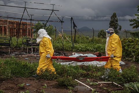 RACE against the outbreak Medical workers in full protective gear transport a patient at a hospital in Rwampara as the Democratic Republic of the Congo battles its latest Ebola outbreak, which the World Health Organization says has claimed 139 lives from nearly 600 probable cases, many in the conflict-hit and hard-to-reach Ituri province.