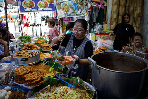 FLAVORS of Quiapo Street food vendors tend sizzling grills and bubbling pots in Quiapo, Manila, serving the flavors that have long animated the district’s bustling streets.