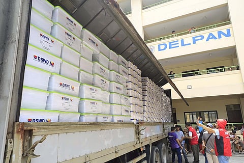 AID TO FIRE VICTIMS: Non-food items from the Department of Social Welfare and Development (DSWD) were distributed on Sunday morning, May 24, at the Delpan Evacuation Center to families affected by the fire that hit Parola Compound, Binondo, Manila on Saturday. (Photo from DSWD).