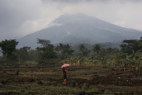 EVEN with the scorching heat, a resident still strolls on a farmland in La Castellana town near Mount Kanlaon Volcano in Negros Occidental.