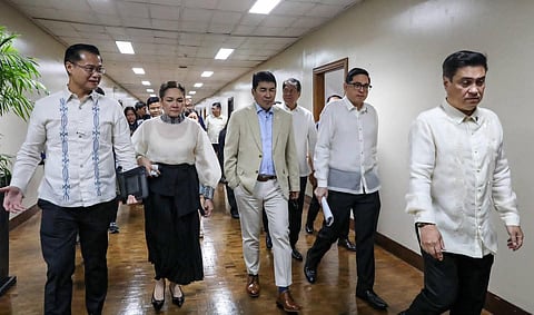 MINORITY bloc senators are seen together after walking out of the plenary session following a heated exchange with the majority over a proposal allowing lawmakers, for justifiable reasons, to attend and participate remotely via teleconference, videoconference, or other electronic means.