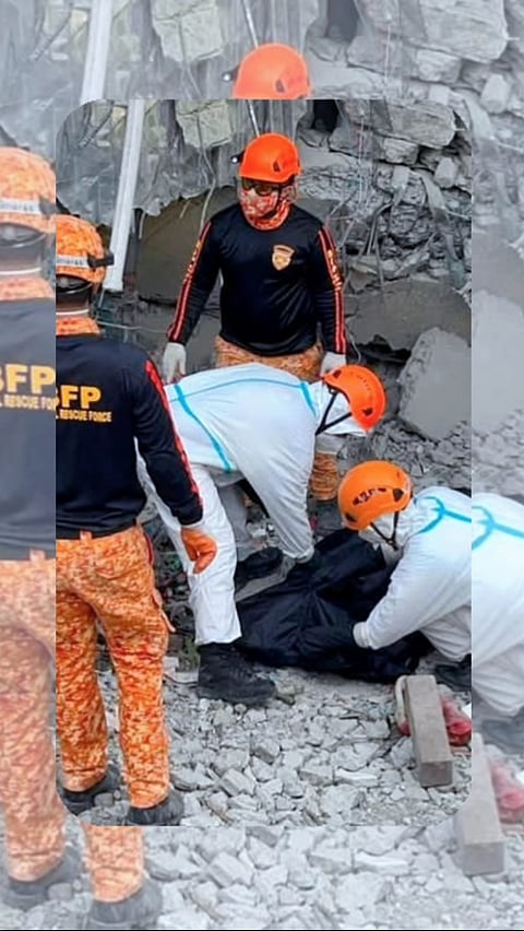 Responders carefully recover the remains of Victim #21, an infant, pulled out at 5:01 PM from Quadrant 2 — the 8th and latest casualty retrieved within June 2, bringing the death toll to 21.