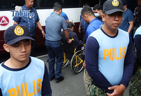 Former Public Works and Highways chief Manuel Bonoan escorted by PNP personnel arrived at Sadiganbayan Second Division on Tuesday 2 June 2026, for the arraignment of his graft case over the alleged flood control kickback scheme.