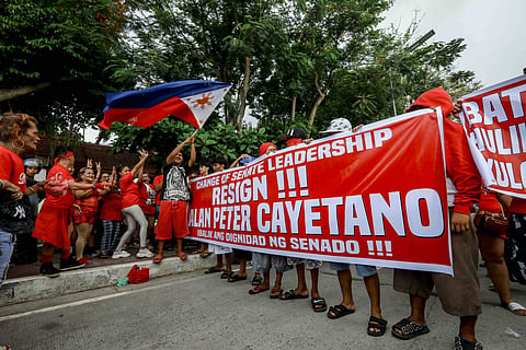 VARIOUS groups rally outside the Senate on JW Diokno Boulevard in Pasay City onTuesday, calling for the resignation of Senate President Alan Peter Cayetano.