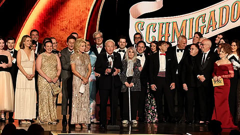 'SCHMIGADOON!' team accepts the Best Musical award.