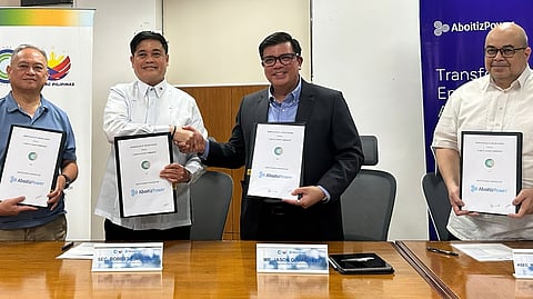 PUTTING their signatures on the memorandum of understanding recently drawn up between Aboitiz Power Corporation (AboitizPower) and the Climate Change Commission are CCC vice chairperson and executive director Robert Borje (center left) and AboitizPower first vice president for External Relations Jason Magnaye (center right), with Mapúa University executive vice president Raul Victor Tan (leftmost) and CCC deputy executive director Romell Antonio Cuenca (rightmost) as witnesses.