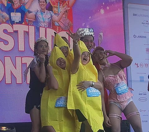 PARTICIPANTS show up in colorful costumes during the Pride Run 2026 last Sunday at the SM Lanang Premier in Davao City.