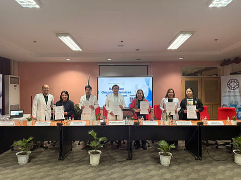 The Medical City (TMC) and Quirino Memorial Medical Center (QMMC) signs a Memorandum of Agreement to formalize a partnership on Radiation Oncology Services. Standing from left to right: Dr. Carlo Angelo Cajucom, Director of TMC’s Augusto P. Sarmiento Cancer Institute; Ms. Maria Carmela Delos Reyes-Ochoa, Chief Finance Officer of TMC Ortigas; Dr. Gregorio S. Martinez Jr., Chief Medical Officer of TMC Ortigas; Dr. Ruben G. Kasala, EVP and CEO of TMC Ortigas; Dr. Evelyn Reside, Medical Center Chief II of QMMC; Dr. Deborah Ann Sales, Chief Medical Professional Staff II of QMMC; Ms. Manylin Umandap, Accountant IV of QMMC.