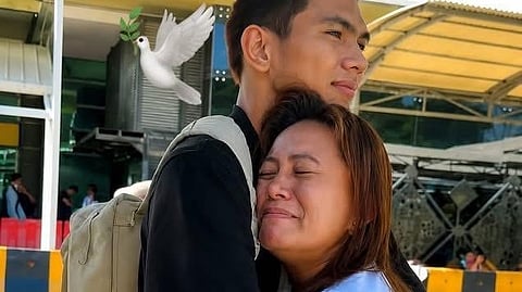 ROVELYN Baterbonia emotionally hugs her son, Rene Clert, shortly before boarding a plane that will bring him to Manila to play college ball at Ateneo de Manila University last week.