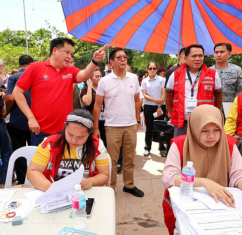 Marcos leads distribution of services, food packs in Sarangani