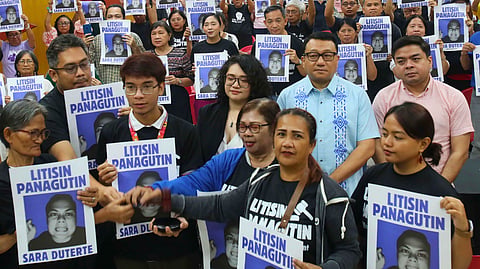 KEEPING tabs on Sara Various groups, from civil society organizations, faith-based groups, legal practitioners, academics, youth leaders and democracy advocates, hold photos of Vice President Sara Duterte during the launch of Bantay Impeachment, a citizen watch campaign promoting public vigilance, accountability and transparency in the ongoing proceedings against the VP.