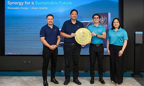 PARTNERS from ACEN RES and ACMobility mark their tie-up to pair renewable energy supply with EV charging for businesses. Shown are (from left): Miguel de Jesus, ACEN managing director and chief operations officer-Philippines; Eric Francia, ACEN president and chief executive officer; Jaime Alfonso Zobel de Ayala, ACMobility CEO; Carla Buencamino, ACMobility head of Mobility Infrastructure.