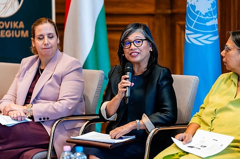VOICE for migrant women Philippine Ambassador to Hungary Maria Elena Algabre (center) speaks at a United Nations conference in Budapest focused on protecting the rights of migrant women.