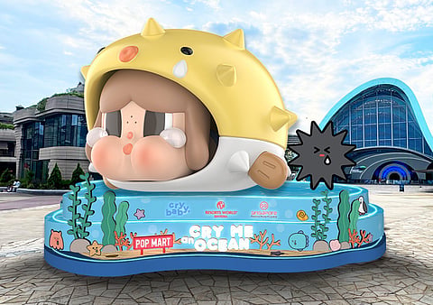 A CRYBABY marine character installation is displayed at Singapore Oceanarium for Pop Mart’s Cry Me an Ocean experience, running from 24 June to 30 August.