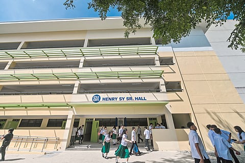THE four-story Henry Sy Sr. Hall building has 24 classrooms equipped with chairs and tables made from recycled plastic waste.